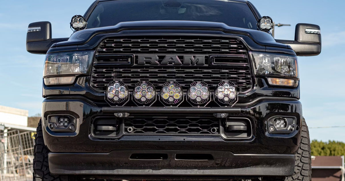 Black RAM truck with aftermarket LED pod lighting installed at Jax Motorsports