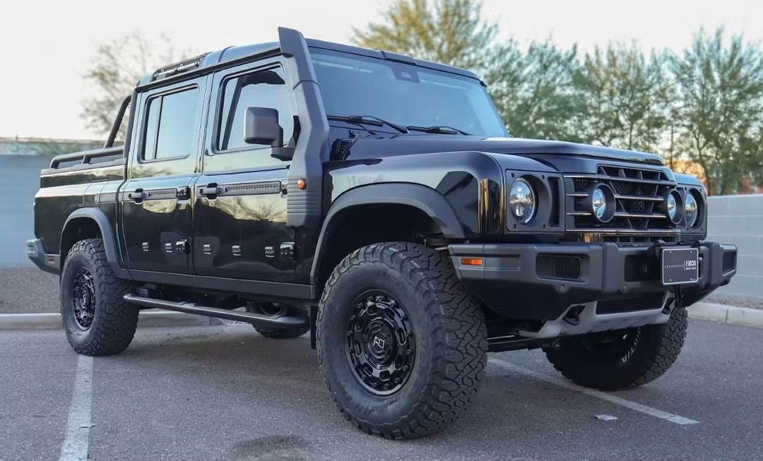 Ineos Grenadier Quartermaster on an Eibach 2.5-inch Pro Lift with 17-inch Black Rhino Atlas wheels and BFGoodrich KO3 tires, built by Jax Motorsports
