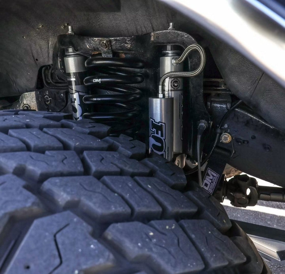 Front suspension detail with dual Fox shocks and Desolate Motorsports coil