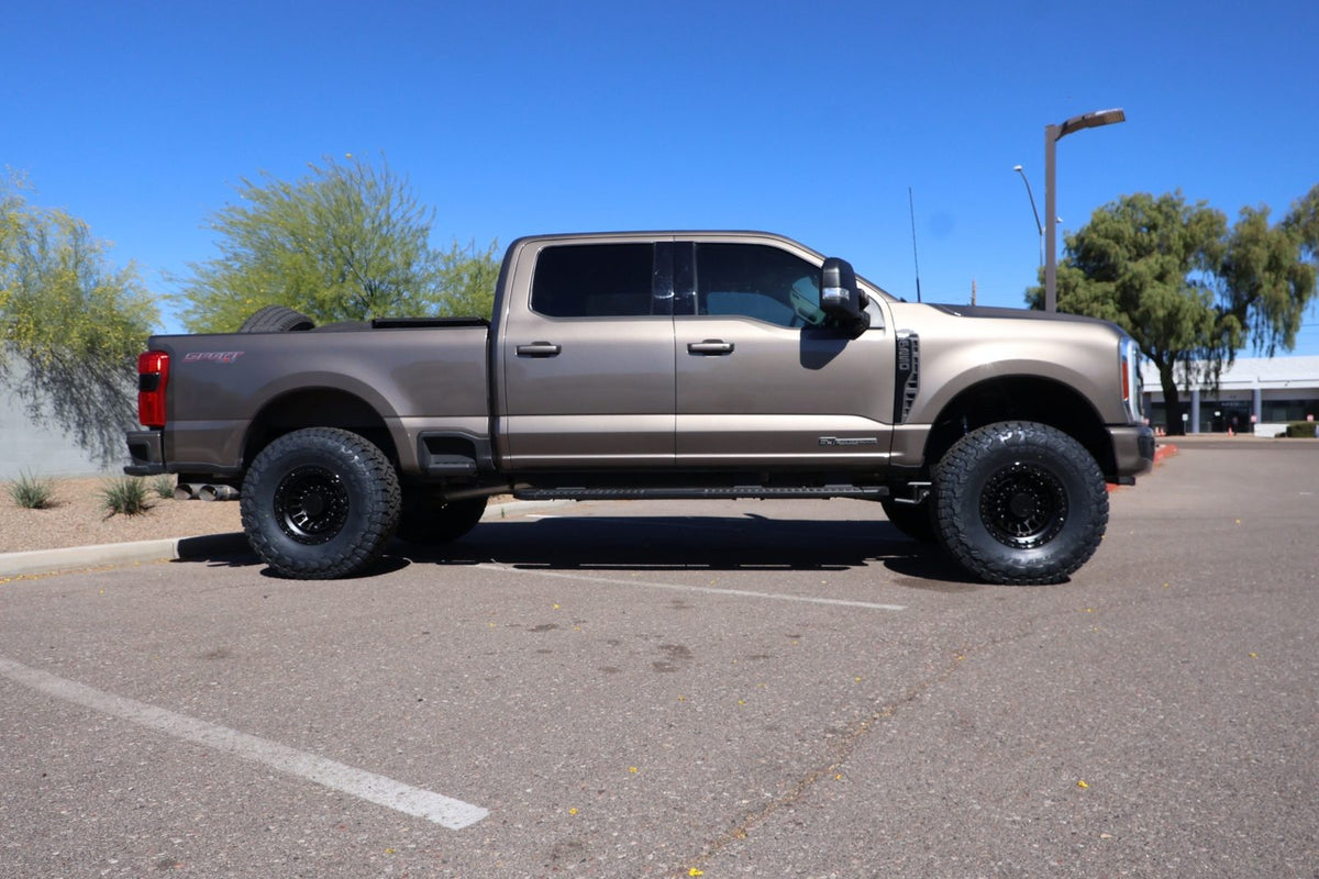 Side profile showing the lifted stance of the 2024 Ford F-250 Super Duty