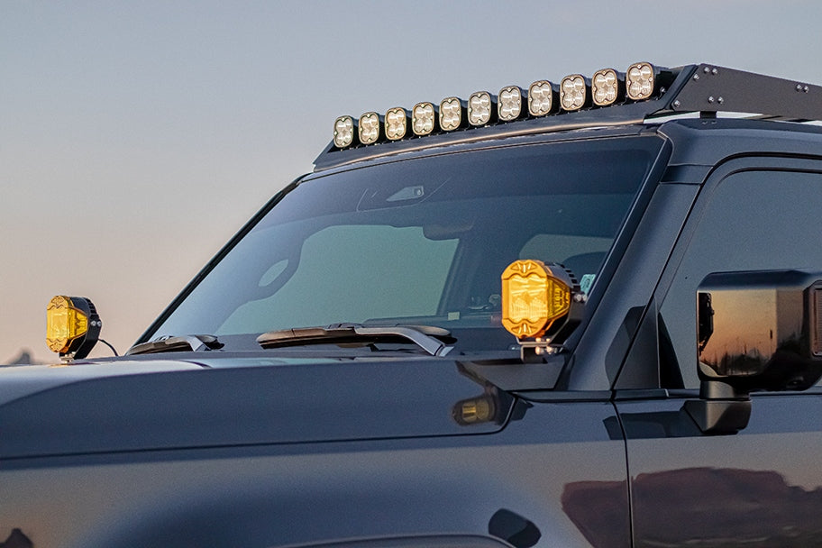 Custom in-house roof rack with 11 Baja Designs Squadron Pros