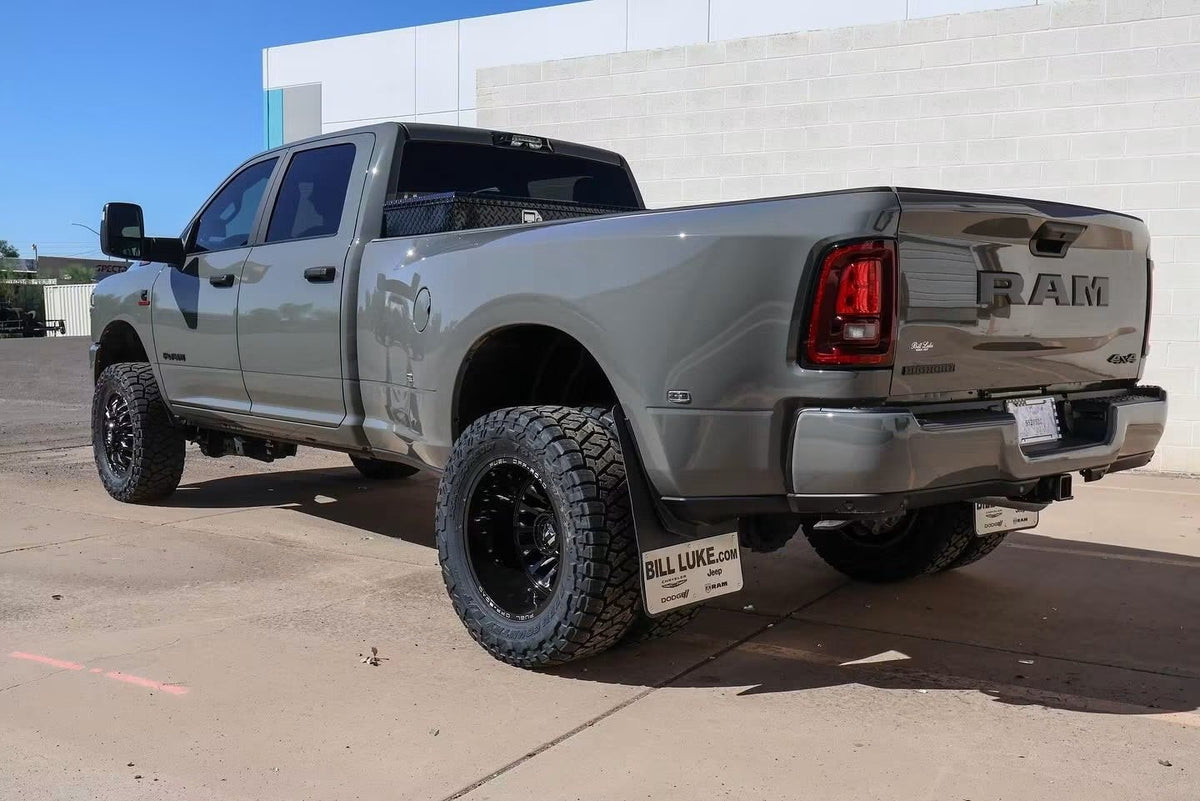 Rear three-quarter view of the grey RAM 3500 dually