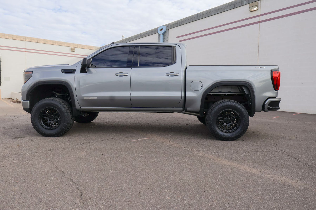 Side profile of the 2025 GMC Sierra 1500 Elevation showing the 6-inch Rough Country lift