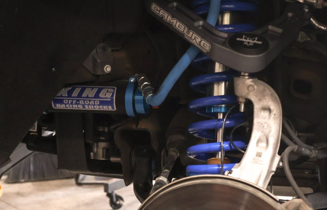 Installed King coilover and Camburg control arm in the front wheel well