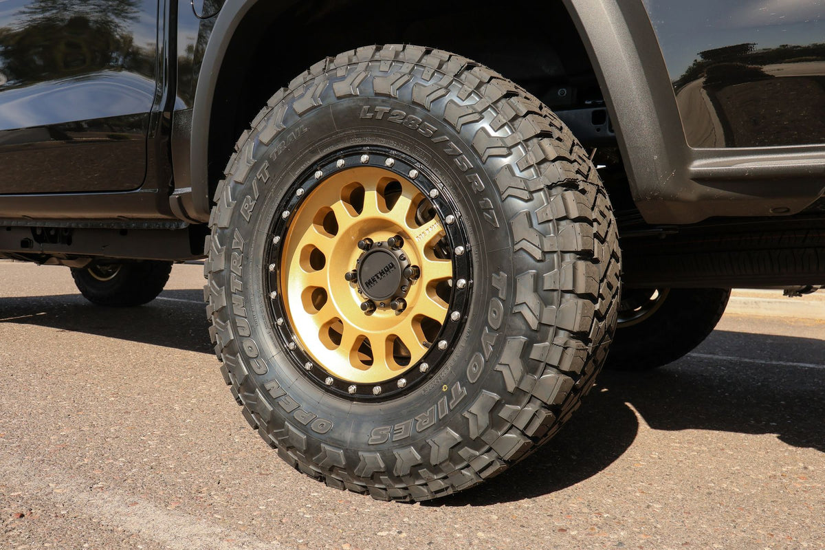 Close-up of a 17x8.5 Method 315 wheel wrapped in an LT285/75R17 Toyo Open Country R/T Trail tire on the Colorado Trail Boss