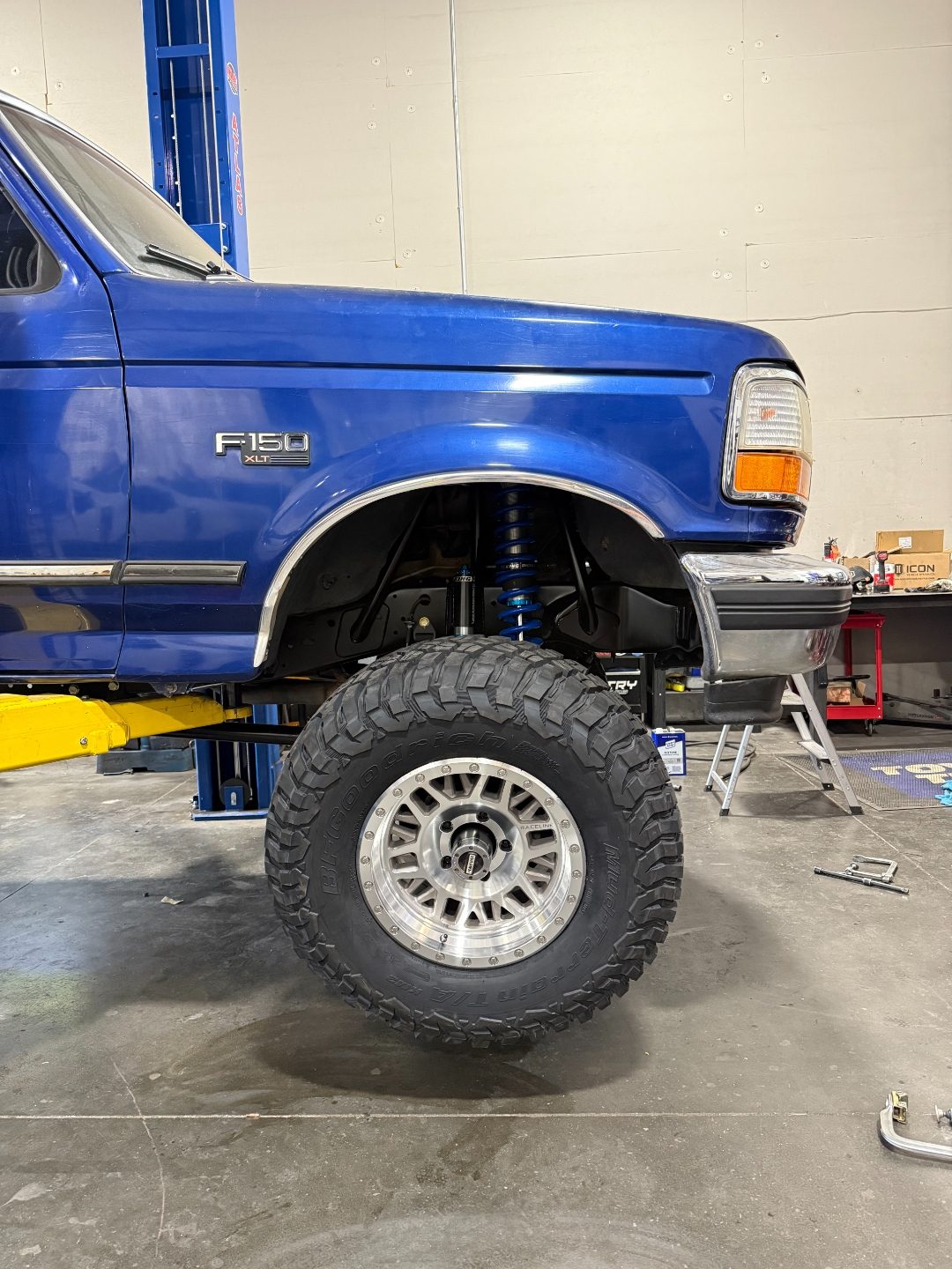 Side profile showing the Raceline wheel and BFG KM3 fitment under the arched fender with King shocks behind